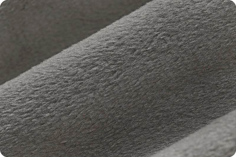 A close up of the fabric for a blanket