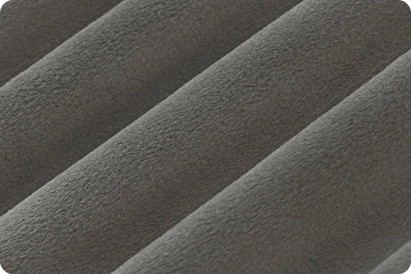 A close up of the fabric for a blanket