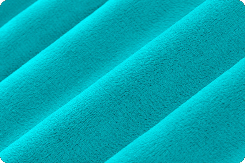 A close up of the fabric for a blanket