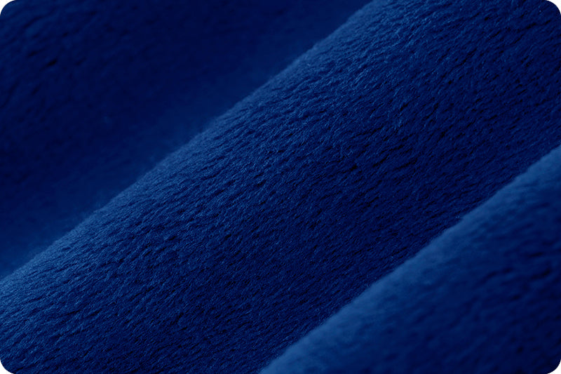 A close up of the blue fabric