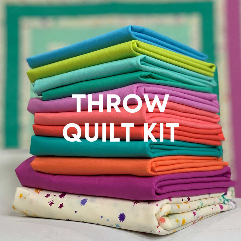 A stack of colorful fabric folded and stacked.