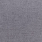 A gray fabric background with some white lines.