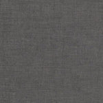A gray fabric background with some white lines.