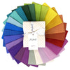 A collection of colorful fabric swatches in a circle.