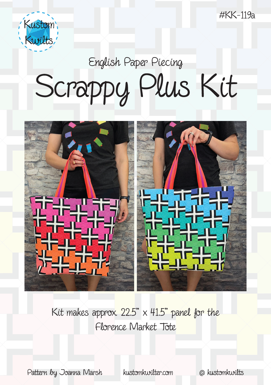 A colorful bag with the words scrappy plus kit on it.