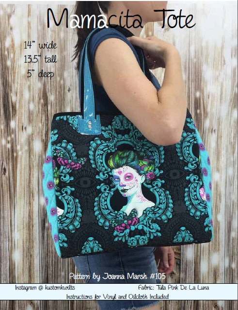 A woman holding onto a bag with a picture of a lady on it