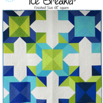 A quilt that is made of different colored squares.