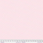 A light pink background with small white dots.