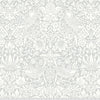 A white floral pattern with birds on it.