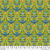 A pattern of green and yellow flowers on a blue background.