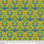 A pattern of green and yellow flowers on a blue background.