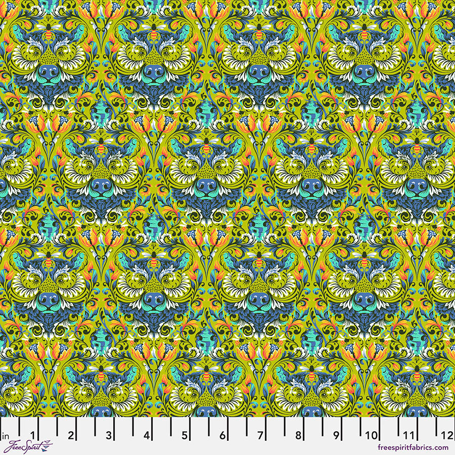 A pattern of green and yellow flowers on a blue background.
