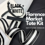 A black and white bag with some stripes on it