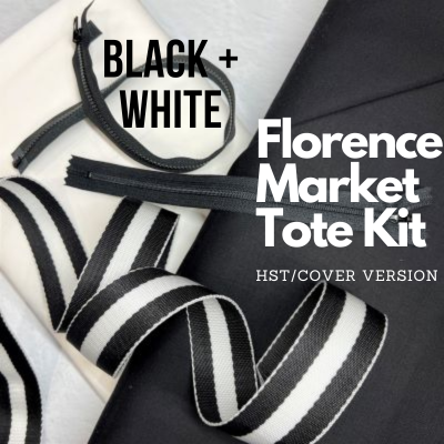 A black and white bag with some stripes on it