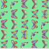 A green background with many different colored butterflies.