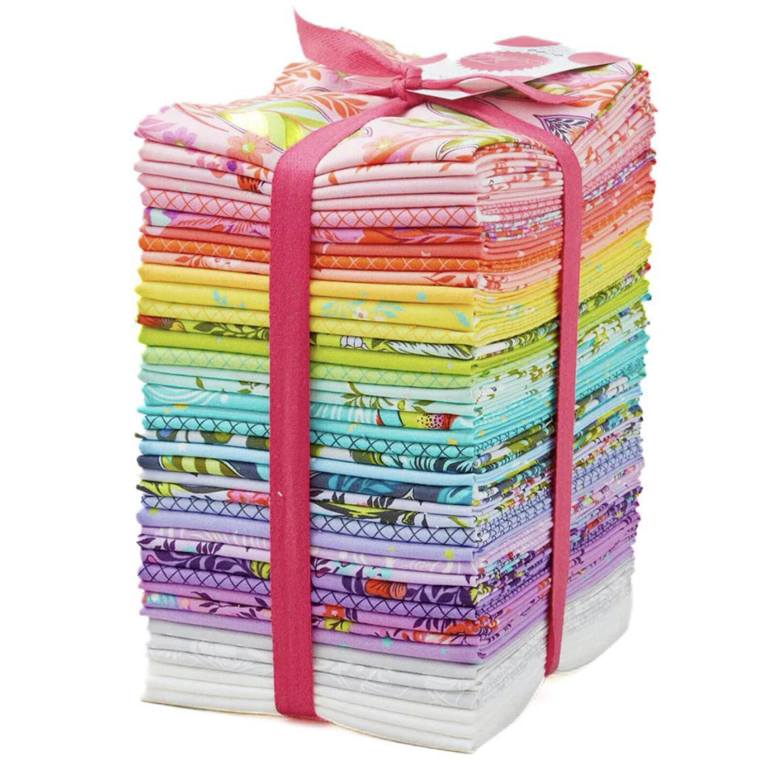 Stack of colorful fabric bundles tied with a pink ribbon.