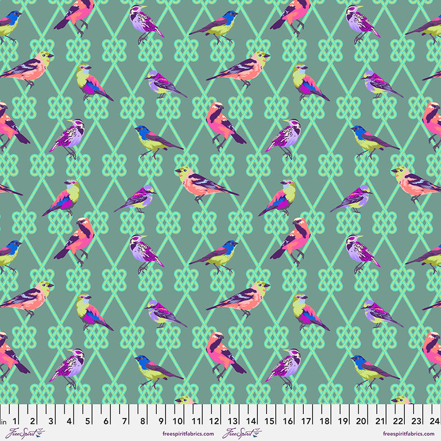 A pattern of birds sitting on top of green and purple argyle.