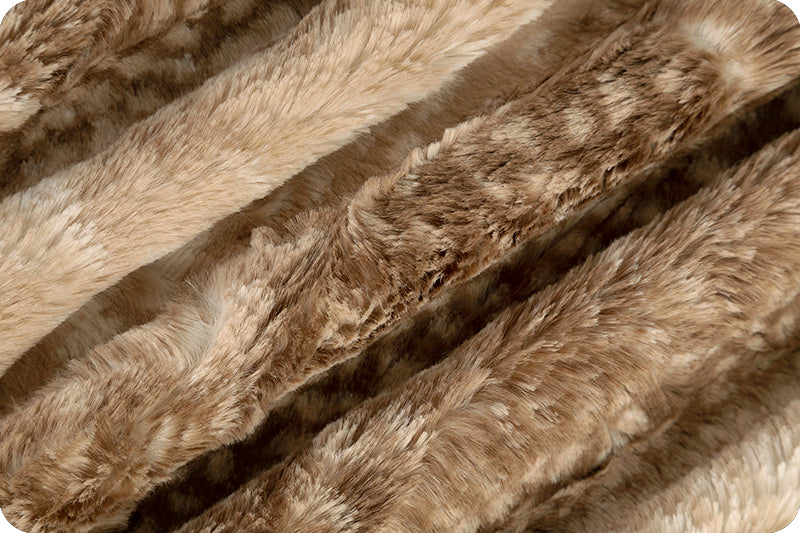 A close up of the fur on a blanket