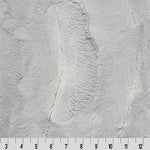 A white fabric with some lines on it