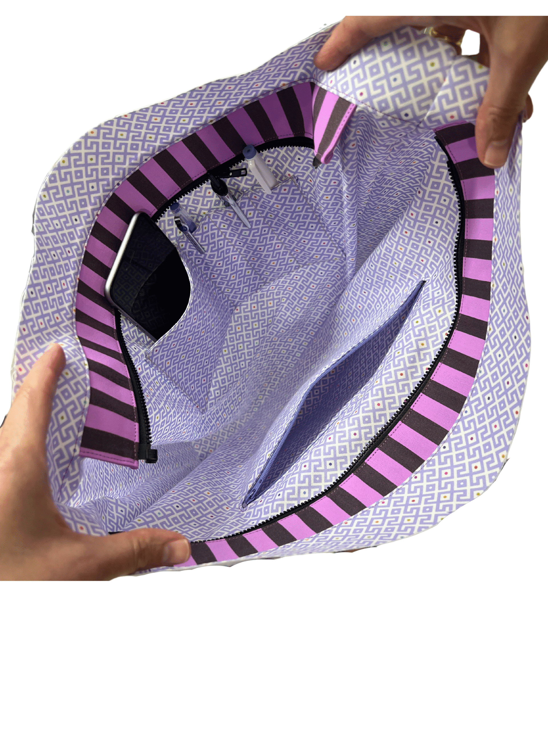 A person holding onto the inside of a bag