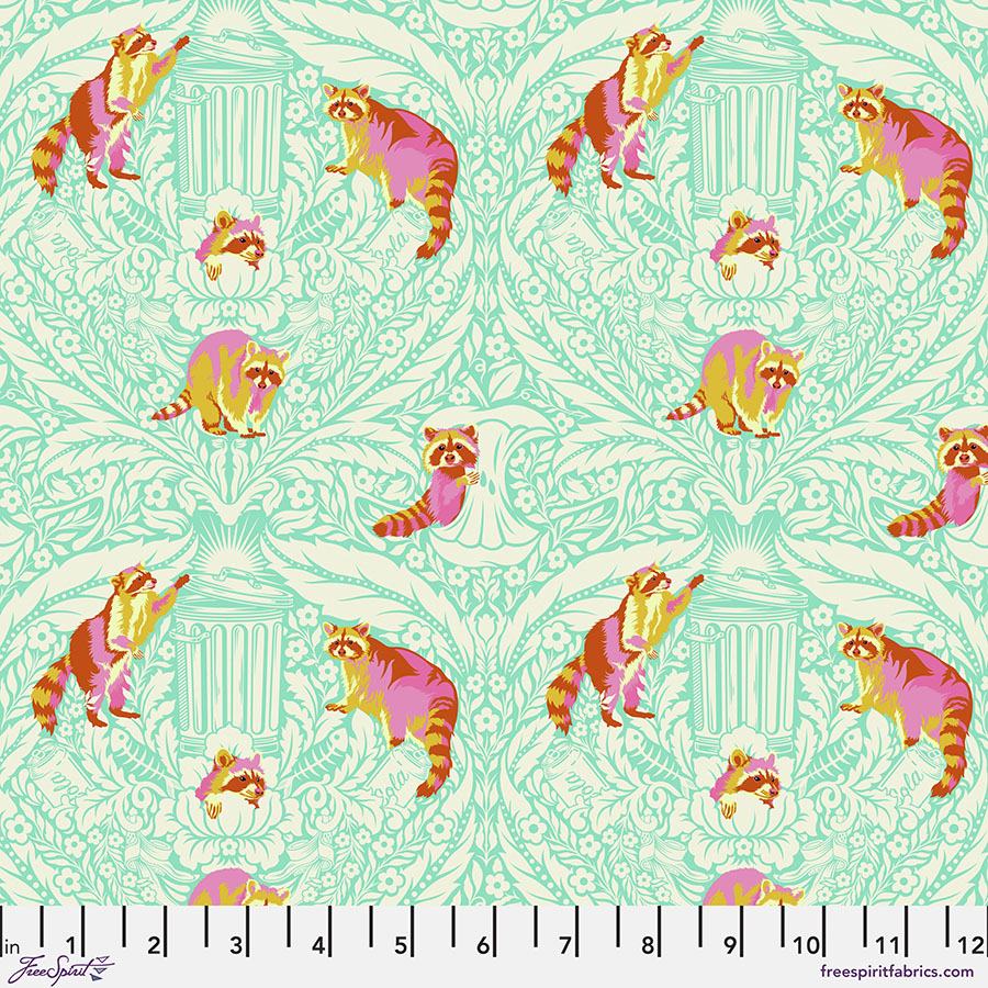 A pattern of cats and birds on a green background.