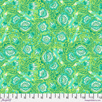 A green floral pattern is shown on fabric.