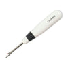 A white and black screwdriver is on the floor.