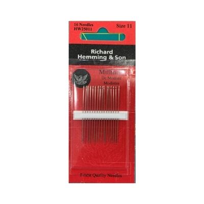 A package of red needles with white tip.
