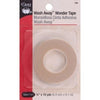 A package of wonder tape with the packaging on it.