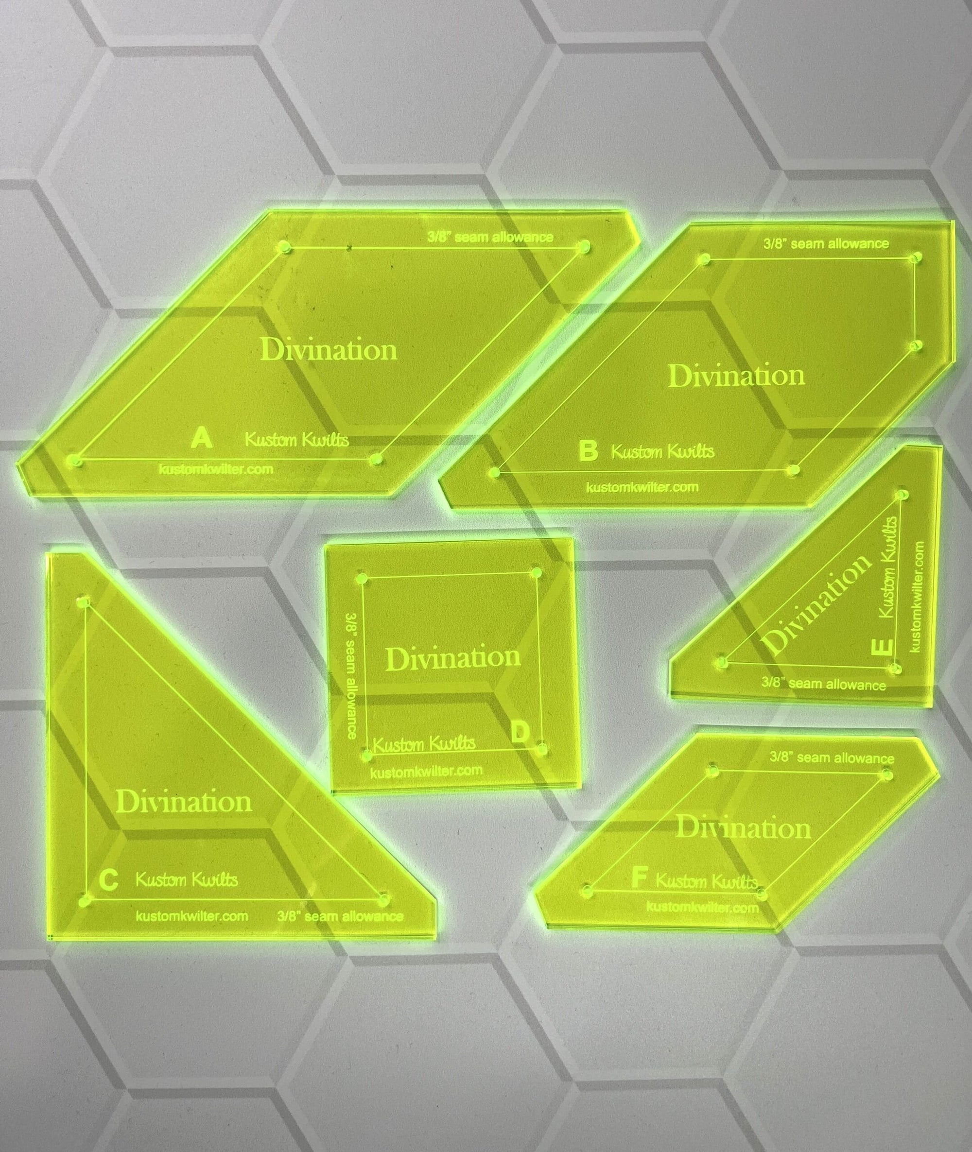 A set of six plastic templates for hexagons.