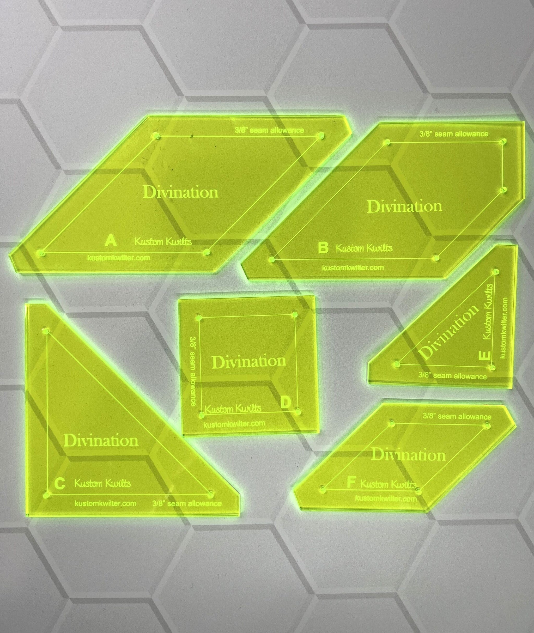 A set of six plastic templates for hexagons.