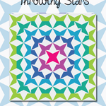 A colorful quilt with the words " throwing stars ".