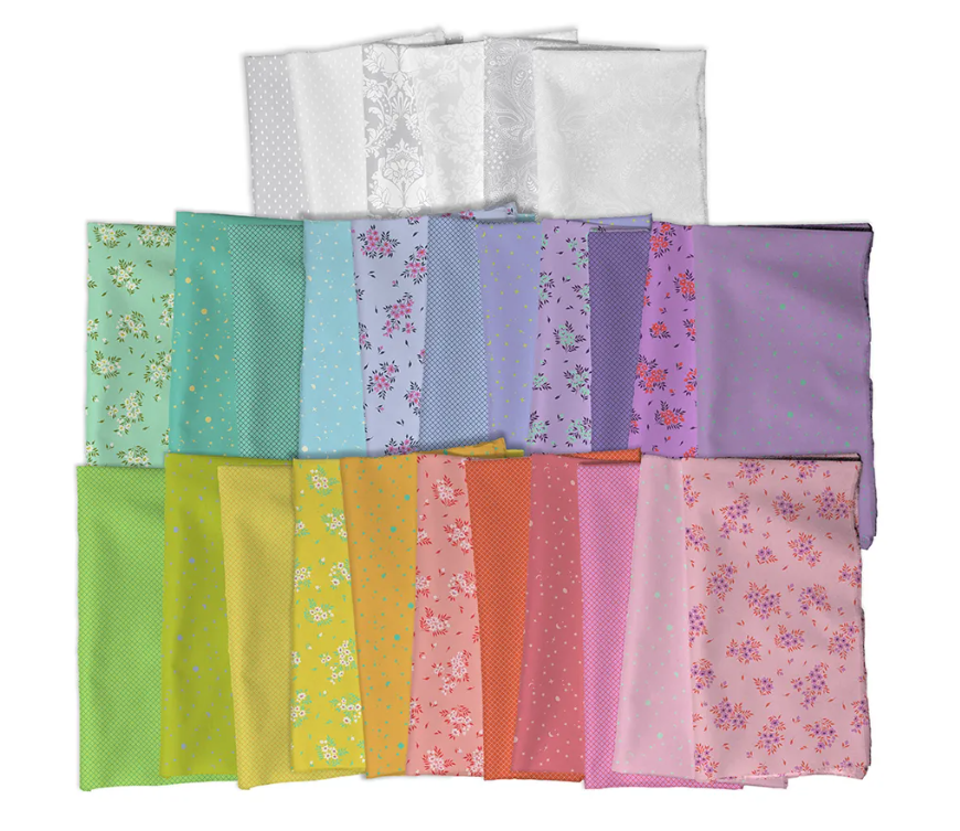 A collection of colorful and patterned fabric pieces arranged neatly.