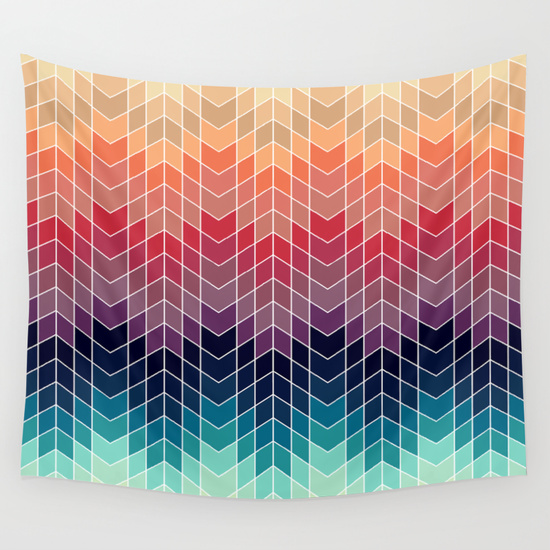 A colorful wall hanging with an abstract design.