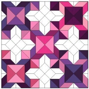 A quilt with purple and pink squares on it.