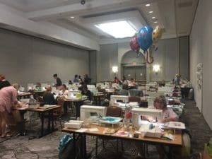 A room filled with lots of tables and chairs.