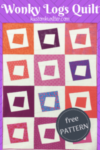 A quilt with squares in the middle of it.