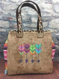 A brown bag with colorful arrows on it