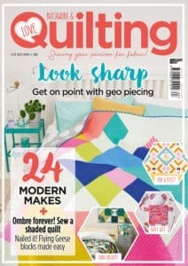 A magazine cover with some quilt designs on it