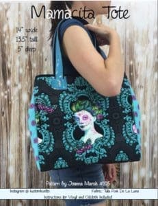 A woman holding onto a bag with a picture of a lady on it