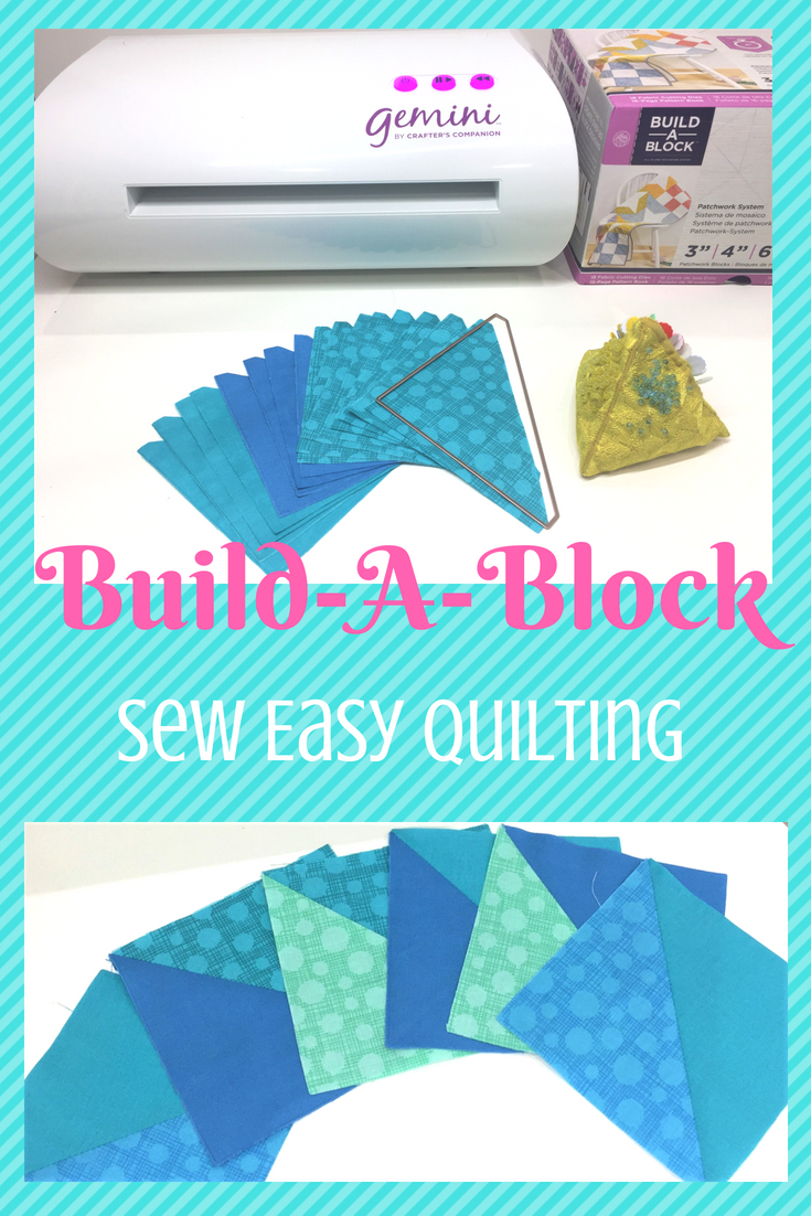 A picture of some blue fabric and the words " build-a block sew easy quilting ".