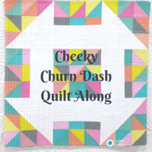 A quilt with the words cheeky churn dash quilt along.