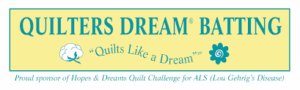 A banner that says quilts like a dream