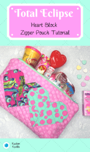 A pink and green zippered pouch with lots of items inside.