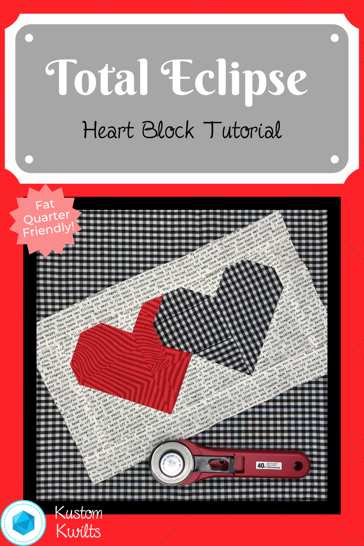 A black and white picture of a heart quilt block.