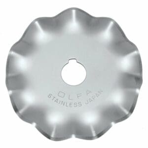 A silver metal blade with the words " olfa stainless steel ".