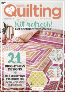 A magazine cover with a quilt on it.