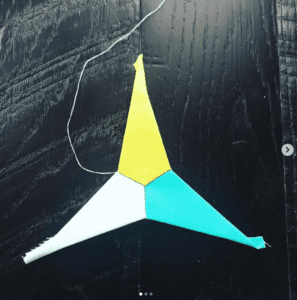 A kite that is shaped like a triangle.