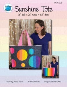 A woman holding onto a large bag with circles on it