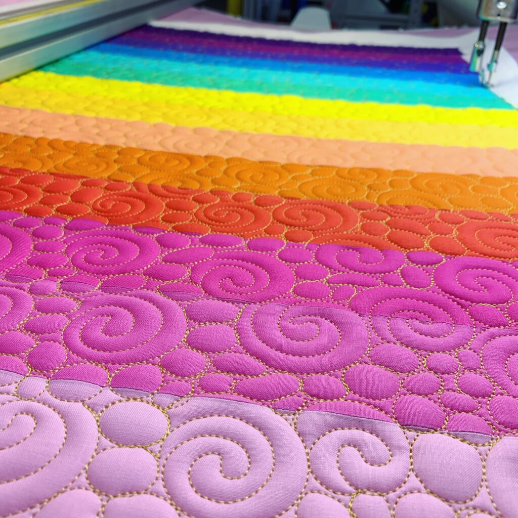 quilting the rainbow panel for the Sunshine Tote